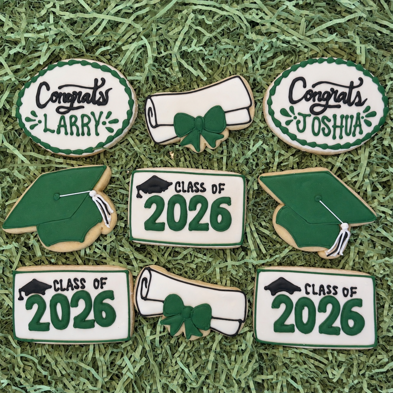 Green and white Class of 2026 graduation cookies